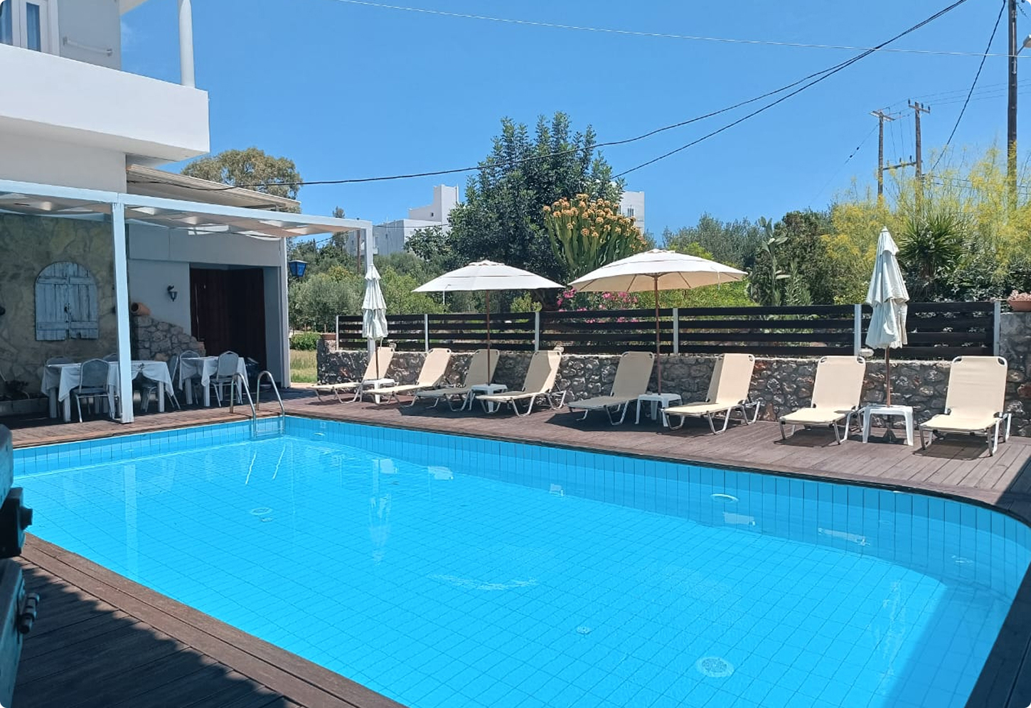 Swimming pool and pool bar at Naiades Almiros River Hotel